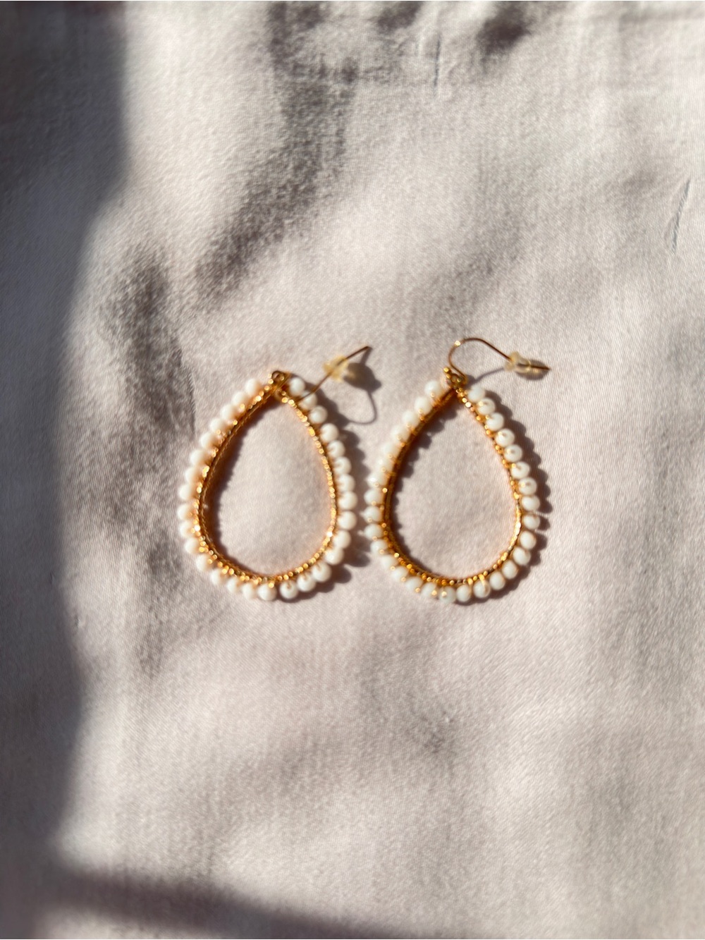 Elegant Gold and White Beaded Teardrop Earrings